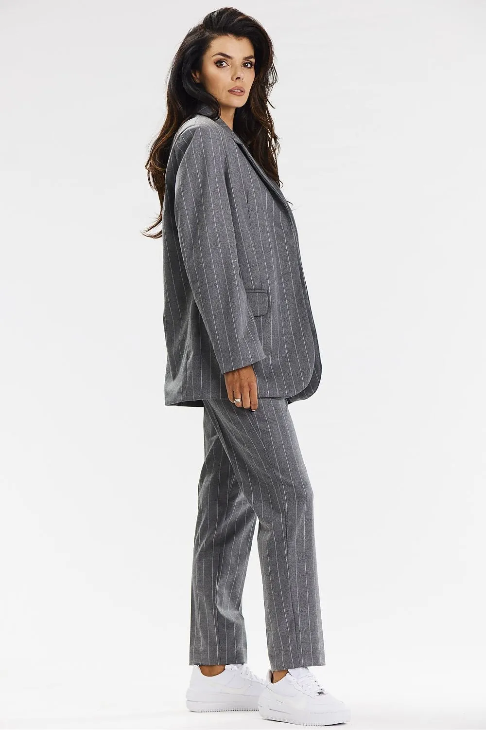 Elegant jacket with a loose striped cut.