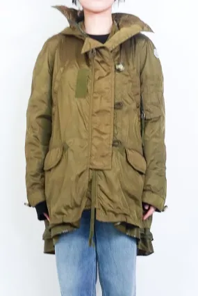 Green raincoat RRP £420
