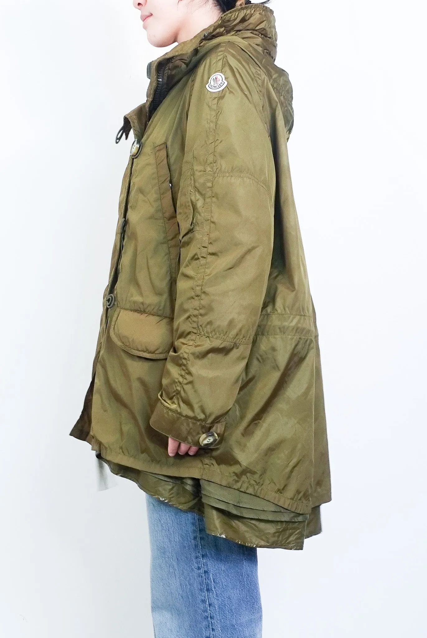 Green raincoat RRP £420