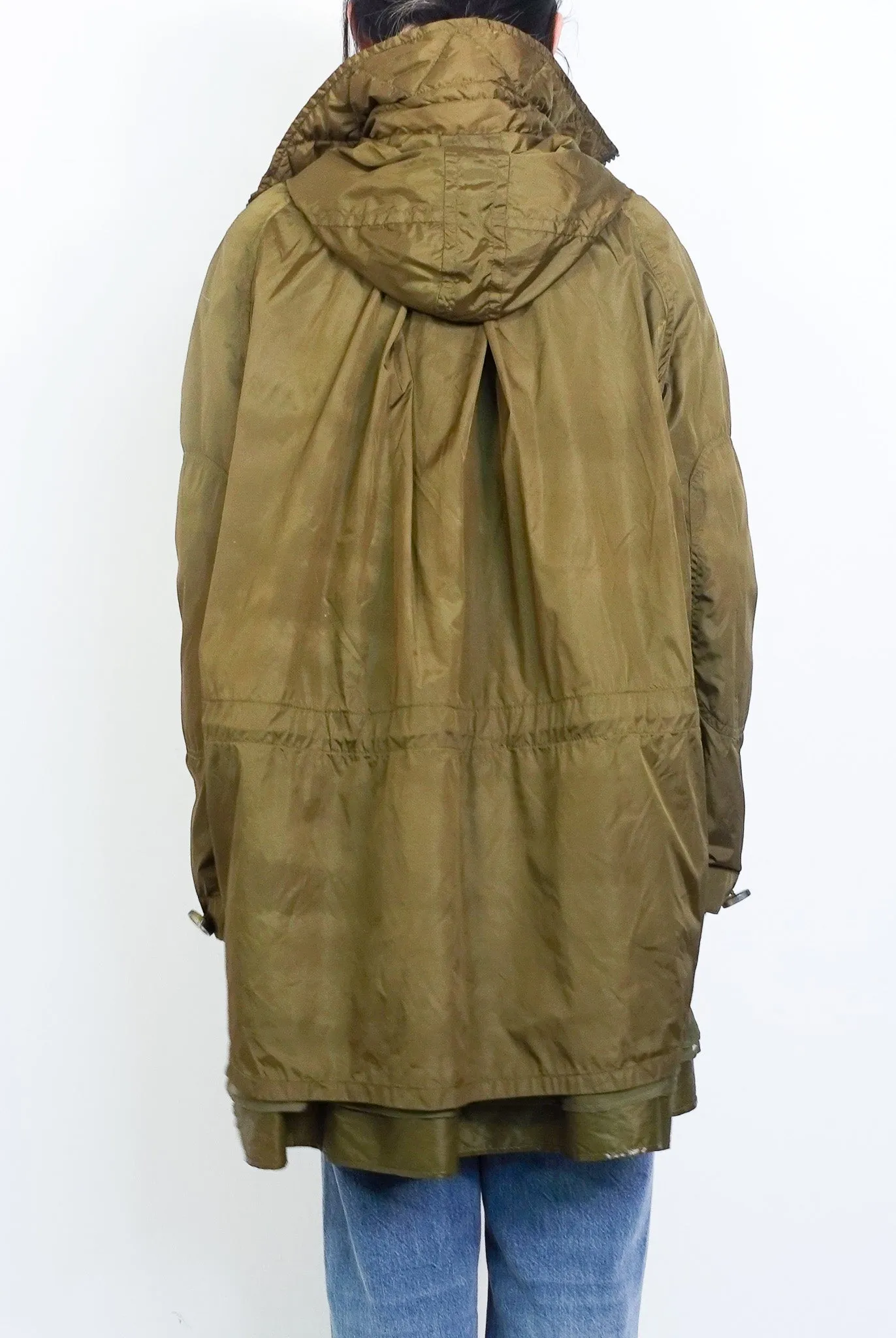 Green raincoat RRP £420